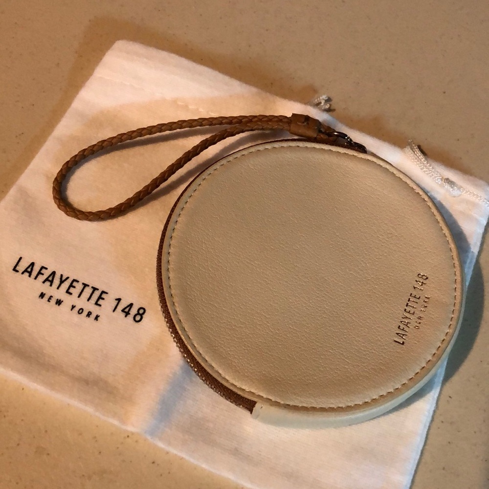 Lafayette 148 New York brand new Zippered coin purse. Comes with dust cover.